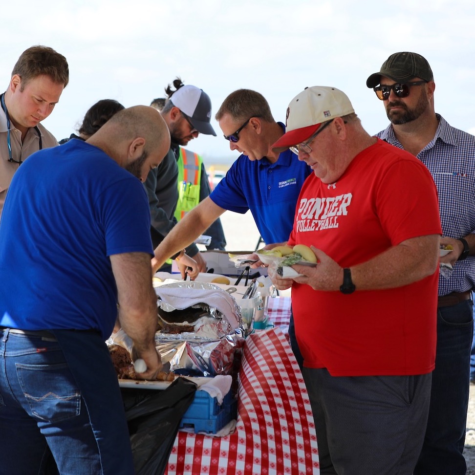 Community members in buffet line