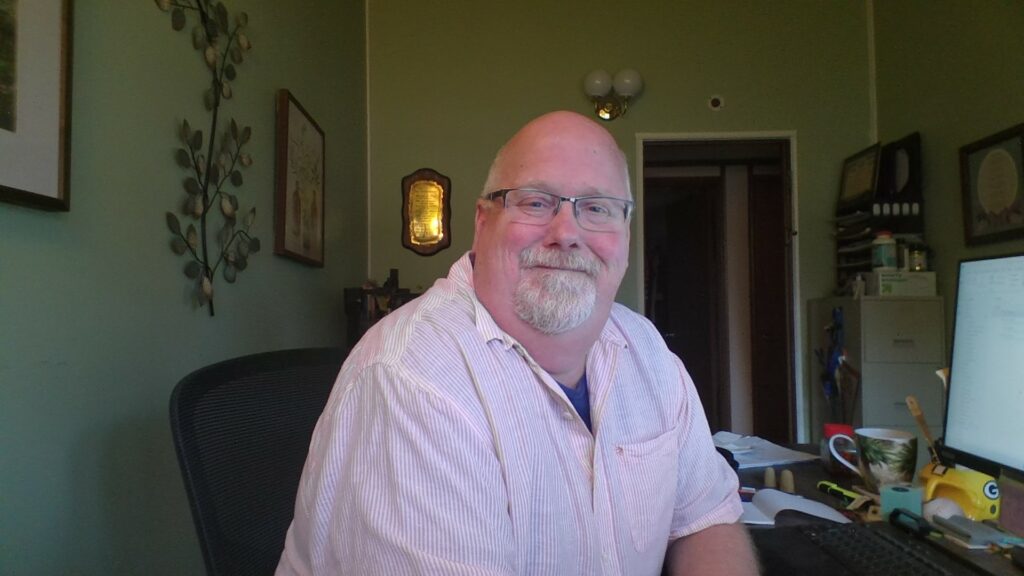 Man in pink shirt