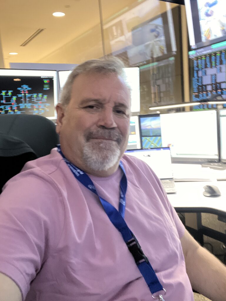 Man in pink shirt