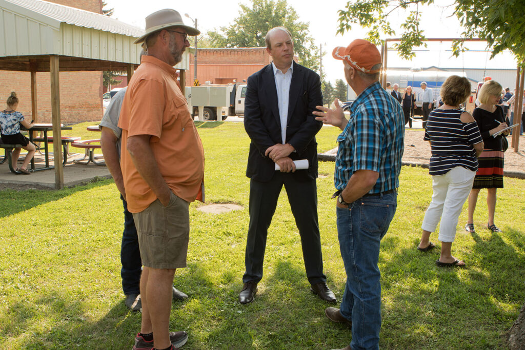 People talking at community event