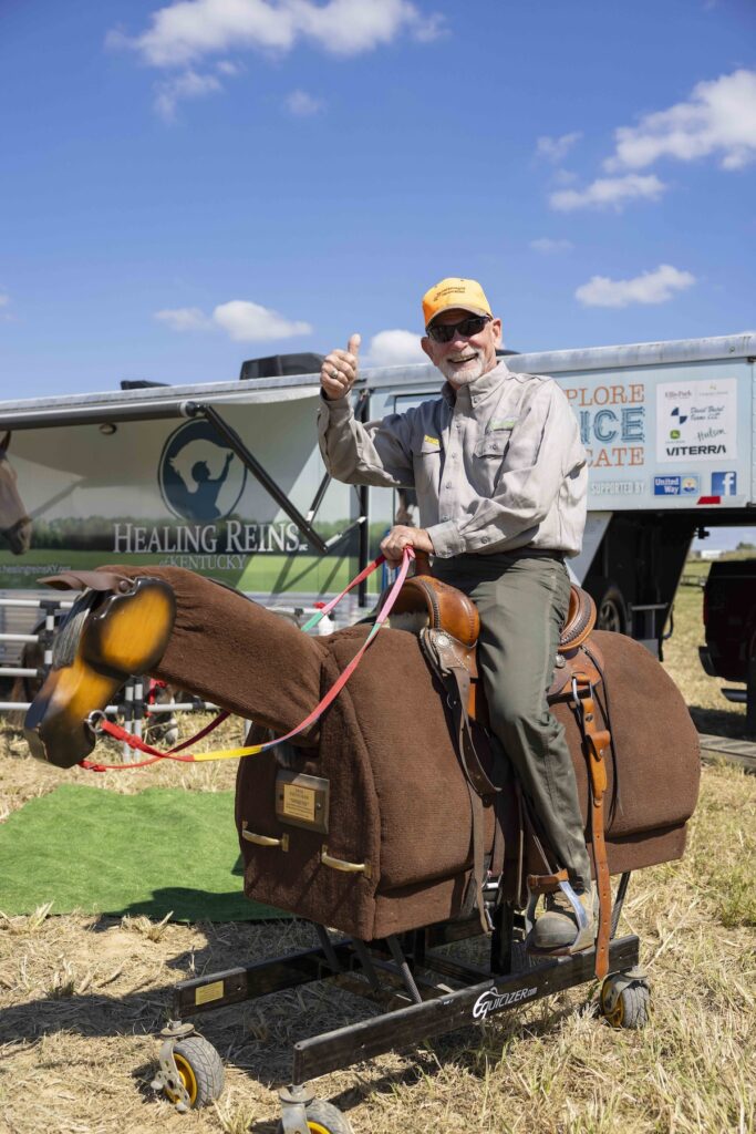Man on mechanical horse