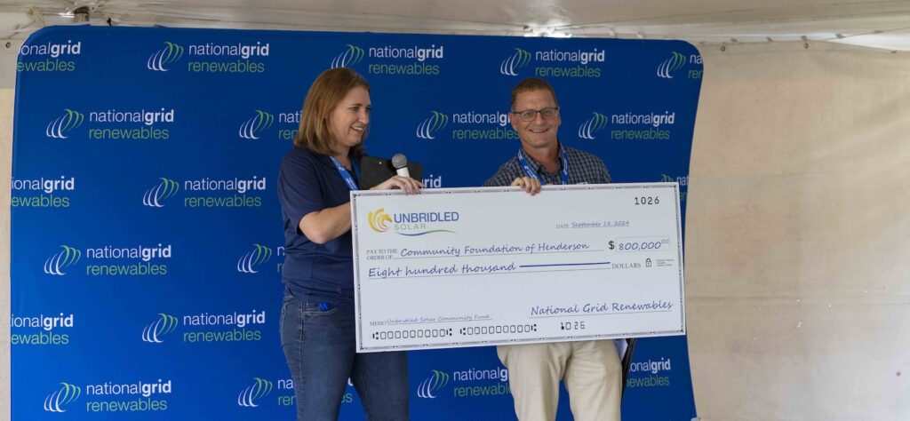 Large donation check presentation
