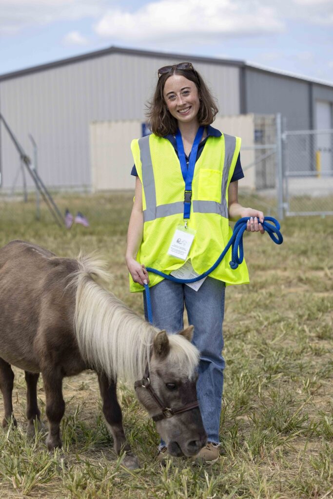 Woman with miniature horse