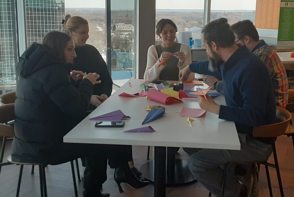 People making paper rockets