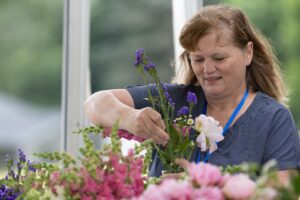 Woman arranging flowers